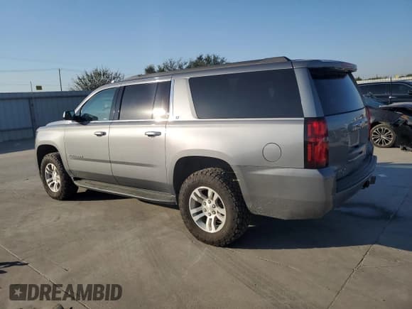 ✅ 2019 Chevrolet Suburban LT • VIN: 1GNSKHKC2KR190799 • Lot: 73763254. Wystawiony na Copart z przebiegiem 94 308 mil. Bezpłatny archiwum sprzedaży aukcyjnych z USA i szczegółowy raport historii pojazdu na DreamBid. Zdjęcie 2.