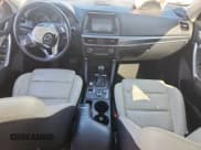 ✅ 2016 Mazda CX-5 Grand Touring • VIN: JM3KE4DY1G0669008 • Lot: 86889025. Listed on Copart with Not provided. Free auction sales archive from the USA and detailed vehicle history report at DreamBid. Image 8.