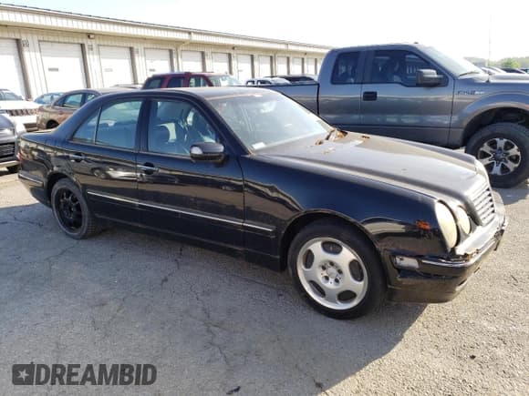 ✅ 2002 Mercedes-Benz E 320 • VIN: WDBJF83J42X071300 • Lot: 52099694. Listed on Copart with 147,155 mi. Free auction sales archive from the USA and detailed vehicle history report at DreamBid. Image 4.
