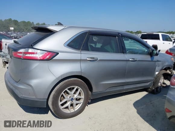 ✅ 2021 Ford Edge SEL • VIN: 2FMPK3J92MBA19933 • Лот: 43206732. Опубликован ранее на IAAI с пробегом 82 432 миль. Бесплатный доступ к архиву аукционных продаж из США и подробный отчёт об истории автомобиля на DreamBid. Изображение 13.