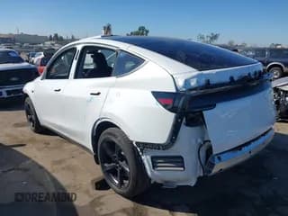 ✅ 2026 Tesla Model Y Long Range Launch Series • VIN: 7SAYGDEEXTF377485 • Lot: 43643082. Listed on IAAI with 1,228 mi. Free auction sales archive from the USA and detailed vehicle history report at DreamBid. Image 3.