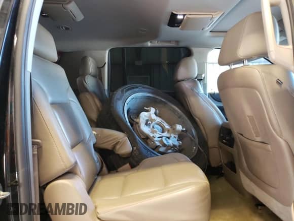 2015 Chevrolet Suburban LTZ с VIN 1GNSCKKC3FR291995, выставлен на аукционе Copart как лот 65895214 с пробегом 153 672 миль миль и Списание • Salvage title. История ставок и продаж доступна на DreamBid. Изображение 11.