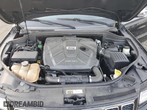 ✅ 2015 Jeep Grand Cherokee Overland • VIN: 1C4RJFCM7FC791589 • Lot: 77454564. Listed on Copart with 128,100 mi. Free auction sales archive from the USA and detailed vehicle history report at DreamBid. Image 12.