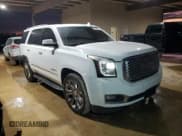 ✅ 2015 GMC Yukon Denali • VIN: 1GKS1CKJ2FR521176 • Lot: 85324304. Listed on Copart with 203,079 mi. Free auction sales archive from the USA and detailed vehicle history report at DreamBid. Image 4.