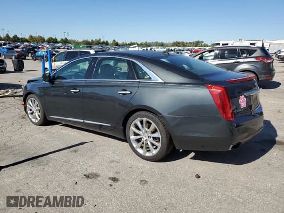 ✅ 2014 Cadillac XTS Luxury • VIN: 2G61N5S39E9225270 • Lot: 87237635. Wystawiony na Copart z przebiegiem 127 697 mil. Bezpłatny archiwum sprzedaży aukcyjnych z USA i szczegółowy raport historii pojazdu na DreamBid. Zdjęcie 2.