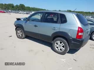 2007 Hyundai Tucson SE with VIN KM8JN12D37U491920, listed as a IAAI auction lot 43245246 with 168,228 mi miles and . Bid and sale history available at DreamBid. Image 3.