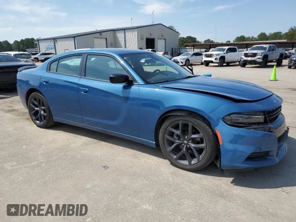 ✅ 2023 Dodge Charger SXT • VIN: 2C3CDXBG9PH603981 • Lot: 70631175. Listed on Copart with 27,114 mi. Free auction sales archive from the USA and detailed vehicle history report at DreamBid. Image 4.