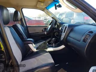 ✅ 2007 Mercury Mariner Premier • VIN: 4M2CU97127KJ20444 • Лот: 40810464. Опубликован ранее на IAAI с пробегом 163 702 миль. Бесплатный доступ к архиву аукционных продаж из США и подробный отчёт об истории автомобиля на DreamBid. Изображение 5.