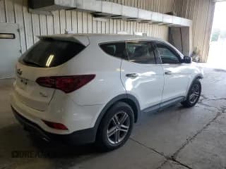 ✅ 2017 Hyundai Santa Fe 2.4L • VIN: 5NMZTDLB8HH027381 • Лот: 65454463. Опубликован ранее на Copart с пробегом Не указан. Бесплатный доступ к архиву аукционных продаж из США и подробный отчёт об истории автомобиля на DreamBid. Изображение 3.