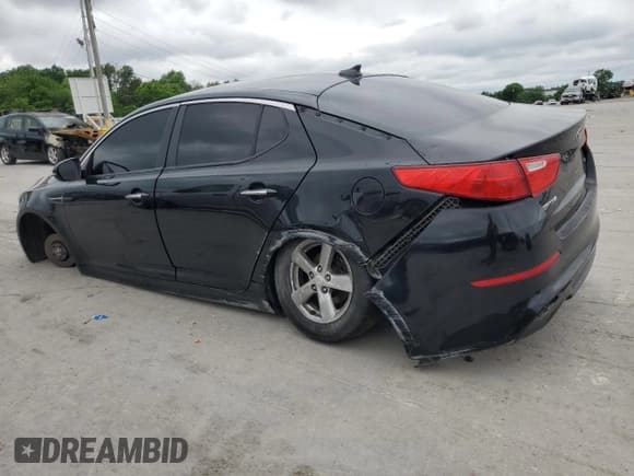 ✅ 2015 Kia Optima LX • VIN: 5XXGM4A78FG439623 • Lot: 56041285. Listed on Copart with 185,636 mi. Free auction sales archive from the USA and detailed vehicle history report at DreamBid. Image 2.