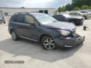 ✅ 2017 Subaru Forester Touring • VIN: JF2SJAWC4HH467501 • Lot: 54208465. Listed on Copart with 128,999 mi. Free auction sales archive from the USA and detailed vehicle history report at DreamBid. Image 4.