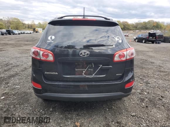 ✅ 2012 Hyundai Santa Fe SE • VIN: 5XYZHDAG3CG128170 • Lot: 89574305. Listed on Copart with 150,996 mi. Free auction sales archive from the USA and detailed vehicle history report at DreamBid. Image 6.