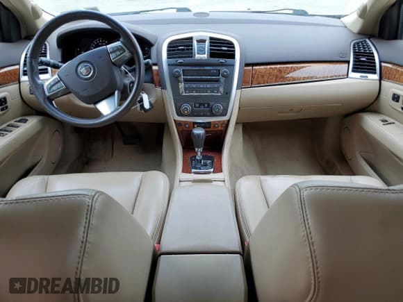 ✅ 2008 Cadillac SRX AWD • VIN: 1GYEE437380137320 • Lot: 58853675. Wystawiony na Copart z przebiegiem 140 544 mil. Bezpłatny archiwum sprzedaży aukcyjnych z USA i szczegółowy raport historii pojazdu na DreamBid. Zdjęcie 8.