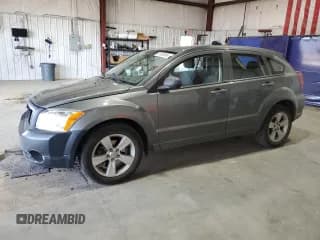 ✅ 2012 Dodge Caliber SXT • VIN: 1C3CDWDA5CD534054 • Lot: 61586595. Listed on Copart with 137,474 mi. Free auction sales archive from the USA and detailed vehicle history report at DreamBid. Image 1.