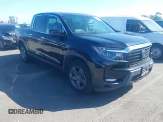 ✅ 2021 Honda Ridgeline RTL-E • VIN: 5FPYK3F76MB002045 • Lot: 43472489. Listed on IAAI with 53,593 mi. Free auction sales archive from the USA and detailed vehicle history report at DreamBid. Image 1.