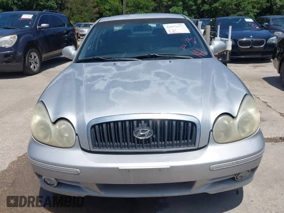 2004 Hyundai Sonata with VIN KMHWF25H04A033563, listed as a IAAI auction lot 42459177 with 203,462 mi miles and . Bid and sale history available at DreamBid. Image 6.