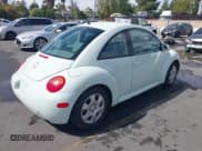 ✅ 2002 Volkswagen Beetle GLS • VIN: 3VWCB21C92M454501 • Lot: 43358460. Listed on IAAI with 64,980 mi. Free auction sales archive from the USA and detailed vehicle history report at DreamBid. Image 4.