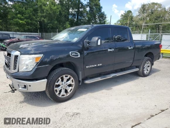 ✅ 2017 Nissan Titan SV • VIN: 1N6AA1F25HN549415 • Лот: 64027474. Опубликован ранее на Copart с пробегом 186 736 миль. Бесплатный доступ к архиву аукционных продаж из США и подробный отчёт об истории автомобиля на DreamBid. Изображение 1.