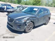 ✅ 2016 Mazda CX-5 Grand Touring • VIN: JM3KE4DY3G0912088 • Lot: 42203530. Wystawiony na IAAI z przebiegiem 86 914 mil. Bezpłatny archiwum sprzedaży aukcyjnych z USA i szczegółowy raport historii pojazdu na DreamBid. Zdjęcie 17.