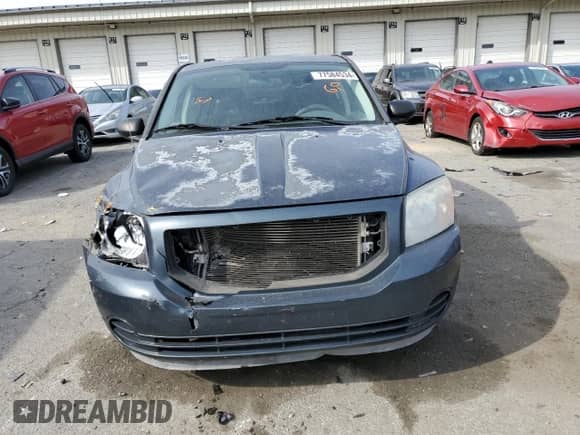 2007 Dodge Caliber с VIN 1B3HB28BX7D182387, выставлен на аукционе Copart как лот 77584534 с пробегом 157 578 миль миль и Списание • Salvage title. История ставок и продаж доступна на DreamBid. Изображение 5.