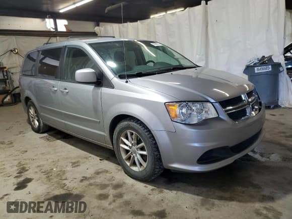 ✅ 2015 Dodge Grand Caravan SXT • VIN: 2C4RDGCGXFR591384 • Lot: 90999655. Listed on Copart with 214,816 mi. Free auction sales archive from the USA and detailed vehicle history report at DreamBid. Image 4.