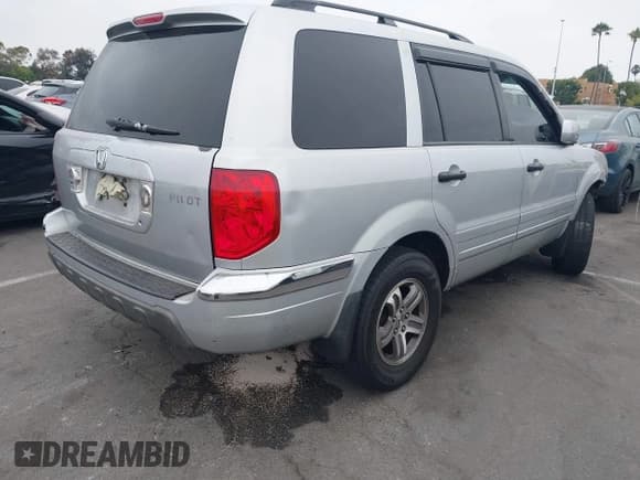 ✅ 2004 Honda Pilot EX • VIN: 2HKYF18634H538796 • Lot: 42706835. Listed on IAAI with Not provided. Free auction sales archive from the USA and detailed vehicle history report at DreamBid. Image 4.