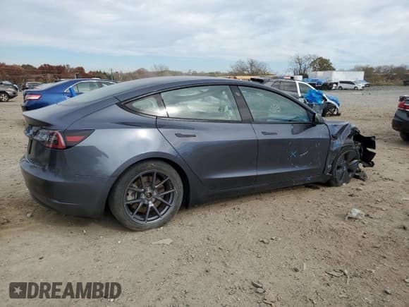 ✅ 2023 Tesla Model 3 • VIN: 5YJ3E1EA5PF448591 • Лот: 85421165. Опубликован ранее на Copart с пробегом 87 674 миль. Бесплатный доступ к архиву аукционных продаж из США и подробный отчёт об истории автомобиля на DreamBid. Изображение 3.