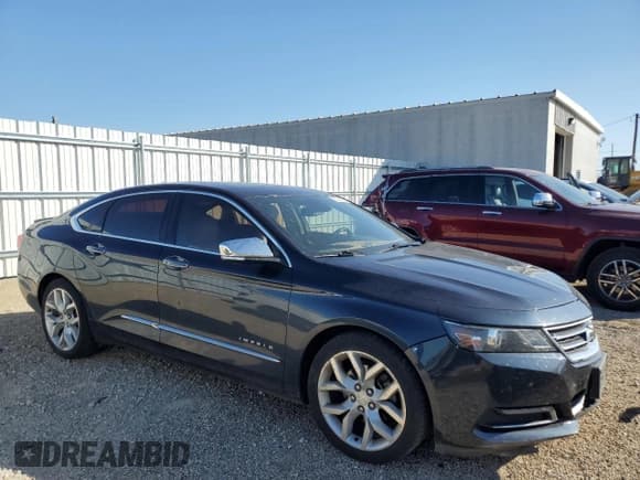 ✅ 2014 Chevrolet Impala LTZ • VIN: 2G1155S39E9275818 • Lot: 82274705. Listed on Copart with 143,681 mi. Free auction sales archive from the USA and detailed vehicle history report at DreamBid. Image 4.