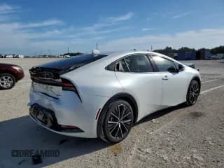 ✅ 2023 Toyota Prius LE • VIN: JTDACAAU6P3008082 • Lot: 69841073. Listed on Copart with 1,189 mi. Free auction sales archive from the USA and detailed vehicle history report at DreamBid. Image 3.