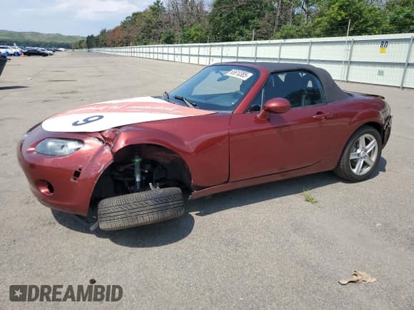 ✅ 2006 Mazda MX-5 Miata Touring • VIN: JM1NC25F960103772 • Lot: 65610385. Wystawiony na Copart z przebiegiem 130 736 mil. Bezpłatny archiwum sprzedaży aukcyjnych z USA i szczegółowy raport historii pojazdu na DreamBid. Zdjęcie 1.