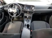 ✅ 2019 Volkswagen Jetta S • VIN: 3VWC57BU9KM240118 • Лот: 60512835. Опубликован ранее на Copart с пробегом 72 596 миль. Бесплатный доступ к архиву аукционных продаж из США и подробный отчёт об истории автомобиля на DreamBid. Изображение 8.