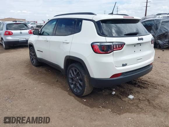 2021 Jeep Compass 80th Anniversary z VIN 3C4NJCEB6MT571564, wystawiony jako IAAI lot #42591643 z przebiegiem 56 999 mil mil oraz . Historia ofert i sprzedaży dostępna na DreamBid. Obrazek 3.