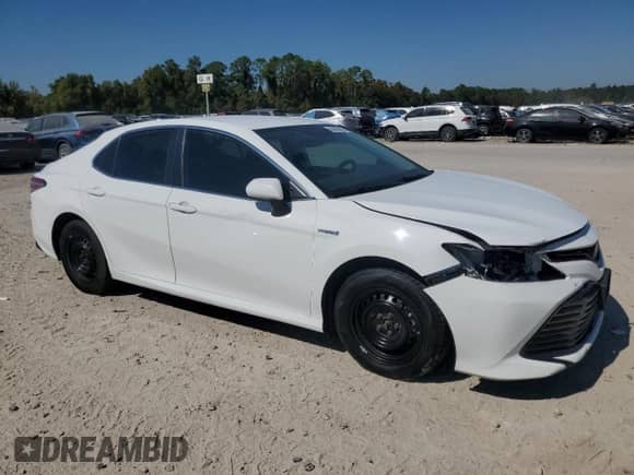2020 Toyota Camry Hybrid LE с VIN 4T1C31AK1LU529993, выставлен на аукционе Copart как лот 86630685 с пробегом 304 307 миль миль и Списание • Salvage title. История ставок и продаж доступна на DreamBid. Изображение 4.