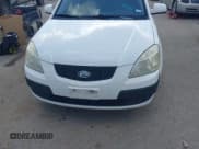 ✅ 2009 Kia Rio LX • VIN: KNADE223696518773 • Лот: 42692771. Опубликован ранее на IAAI с пробегом 156 430 миль. Бесплатный доступ к архиву аукционных продаж из США и подробный отчёт об истории автомобиля на DreamBid. Изображение 6.