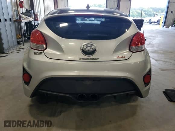 2014 Hyundai Veloster Turbo z VIN KMHTC6AE2EU208474, wystawiony jako Copart lot #65442584 z przebiegiem 57 596 mil mil oraz Szkoda całkowita • Salvage title. Historia ofert i sprzedaży dostępna na DreamBid. Obrazek 6.