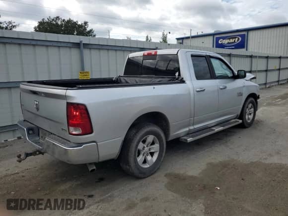 2015 Ram 1500 SLT with VIN 1C6RR6GG1FS569608, listed as a Copart auction lot 84817215 with 279,343 mi miles and Salvage title. Bid and sale history available at DreamBid. Image 3.