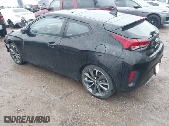 2019 Hyundai Veloster Premium z VIN KMHTG6AF0KU019038, wystawiony jako IAAI lot #41236750 z przebiegiem 83 164 mil mil oraz . Historia ofert i sprzedaży dostępna na DreamBid. Obrazek 3.