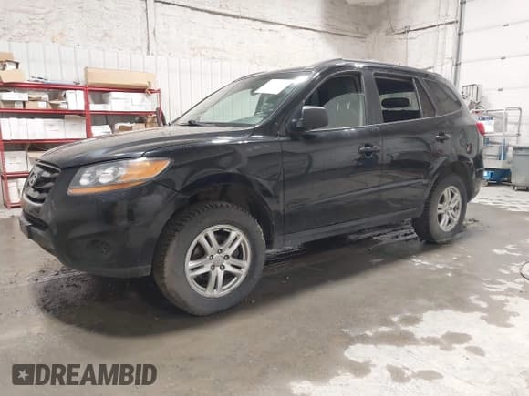 ✅ 2010 Hyundai Santa Fe GLS • VIN: 5NMSGDAB1AH336656 • Lot: 43373980. Listed on IAAI with 164,233 mi. Free auction sales archive from the USA and detailed vehicle history report at DreamBid. Image 2.