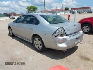 2012 Chevrolet Impala LT Fleet z VIN 2G1WG5E36C1142618, wystawiony jako IAAI lot #42926695 z przebiegiem 249 961 mil mil oraz . Historia ofert i sprzedaży dostępna na DreamBid. Obrazek 3.