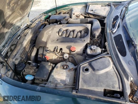 ✅ 2003 Jaguar XK • VIN: SAJDA42C232A31860 • Lot: 88586705. Wystawiony na Copart z przebiegiem 148 846 mil. Bezpłatny archiwum sprzedaży aukcyjnych z USA i szczegółowy raport historii pojazdu na DreamBid. Zdjęcie 11.