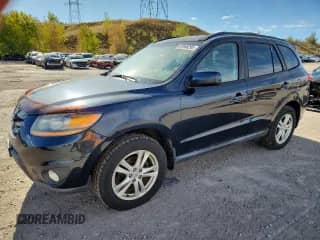 2011 Hyundai Santa Fe SE z VIN 5XYZHDAG6BG046741, wystawiony jako Copart lot #81948295 z przebiegiem 172 657 mil mil oraz Czysty tytuł • Clean title. Historia ofert i sprzedaży dostępna na DreamBid. Obrazek 1.