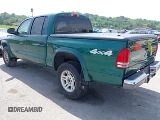 ✅ 2003 Dodge Dakota SLT • VIN: 1D7HG48NX3S278974 • Lot: 42236636. Wystawiony na IAAI z przebiegiem 105 211 mil. Bezpłatny archiwum sprzedaży aukcyjnych z USA i szczegółowy raport historii pojazdu na DreamBid. Zdjęcie 3.