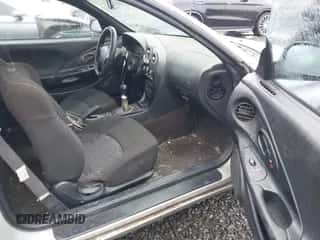 2001 Hyundai Tiburon z VIN KMHJG25F81U267658, wystawiony jako IAAI lot #41092438 z przebiegiem 188 575 mil mil oraz . Historia ofert i sprzedaży dostępna na DreamBid. Obrazek 5.