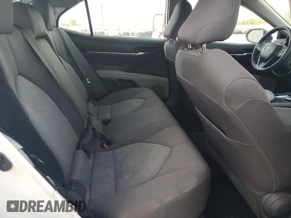 2021 Toyota Camry LE z VIN 4T1C11BK9MU044104, wystawiony jako Copart lot #82030915 z przebiegiem 51 409 mil mil oraz Szkoda całkowita • Salvage title. Historia ofert i sprzedaży dostępna na DreamBid. Obrazek 10.