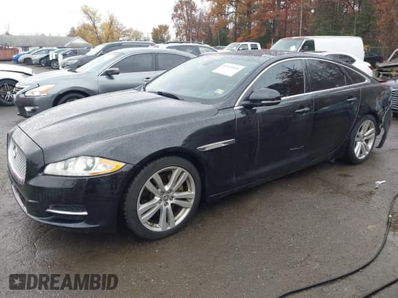 ✅ 2013 Jaguar XJ • VIN: SAJWA1C78D8V58290 • Lot: 43534028. Listed on IAAI with 79,199 mi. Free auction sales archive from the USA and detailed vehicle history report at DreamBid. Image 2.