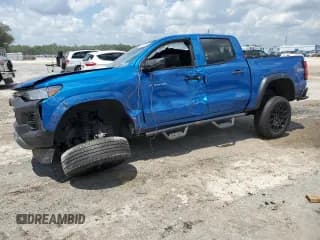 ✅ 2023 Chevrolet Colorado 4WD Trail Boss • VIN: 1GCPTEEK2P1208916 • Лот: 68089094. Опубликован ранее на Copart с пробегом Не указан. Бесплатный доступ к архиву аукционных продаж из США и подробный отчёт об истории автомобиля на DreamBid. Изображение 1.
