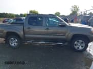 ✅ 2012 Toyota Tacoma PreRunner • VIN: 3TMJU4GNXCM128023 • Lot: 43136343. Listed on IAAI with 134,815 mi. Free auction sales archive from the USA and detailed vehicle history report at DreamBid. Image 6.