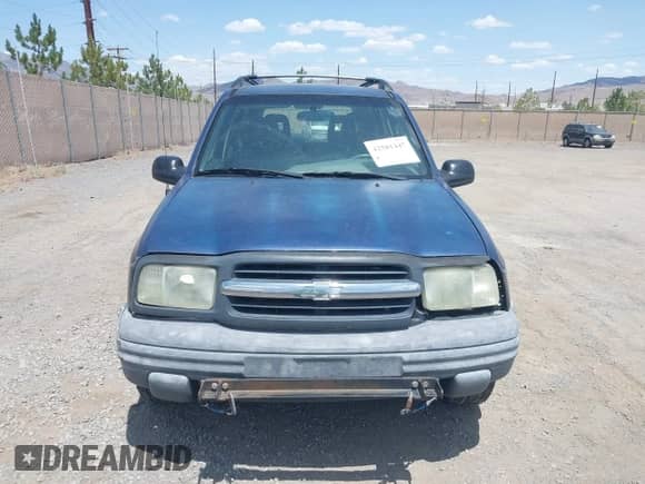 2002 Chevrolet Tracker ZR2 z VIN 2CNBJ734326909319, wystawiony jako IAAI lot #42581447 z przebiegiem 245 396 mil mil oraz . Historia ofert i sprzedaży dostępna na DreamBid. Obrazek 6.