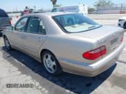 ✅ 2000 Mercedes-Benz E 320 • VIN: WDBJF70J5YB111968 • Lot: 42646770. Listed on IAAI with 130,411 mi. Free auction sales archive from the USA and detailed vehicle history report at DreamBid. Image 3.