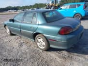 ✅ 1996 Pontiac Grand Am SE • VIN: 1G2NE52M7TC721718 • Lot: 43268073. Wystawiony na IAAI z przebiegiem 115 223 mil. Bezpłatny archiwum sprzedaży aukcyjnych z USA i szczegółowy raport historii pojazdu na DreamBid. Zdjęcie 3.